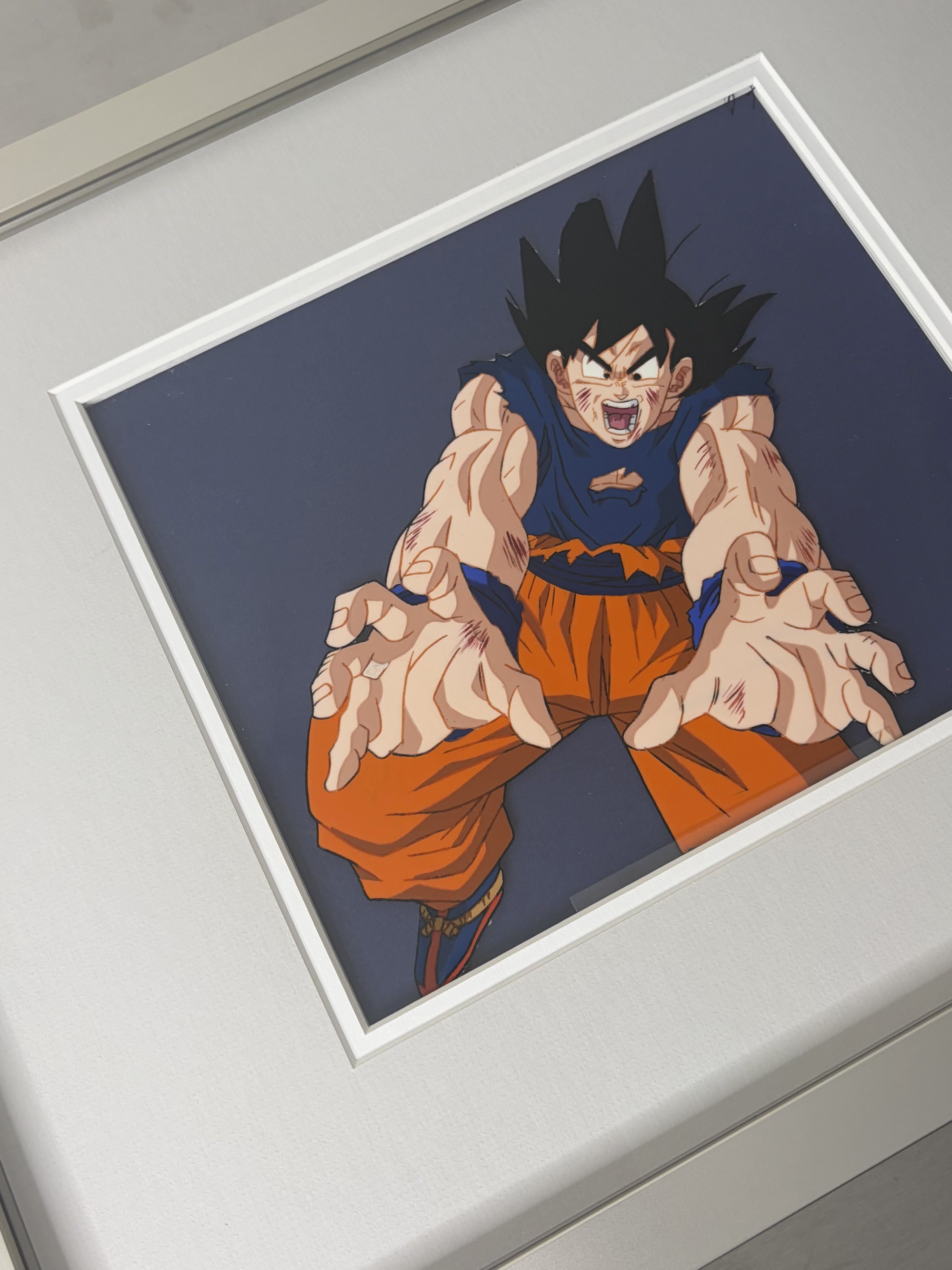 The Archival Cel Frame, 18 by 14 inches, shown with a cel