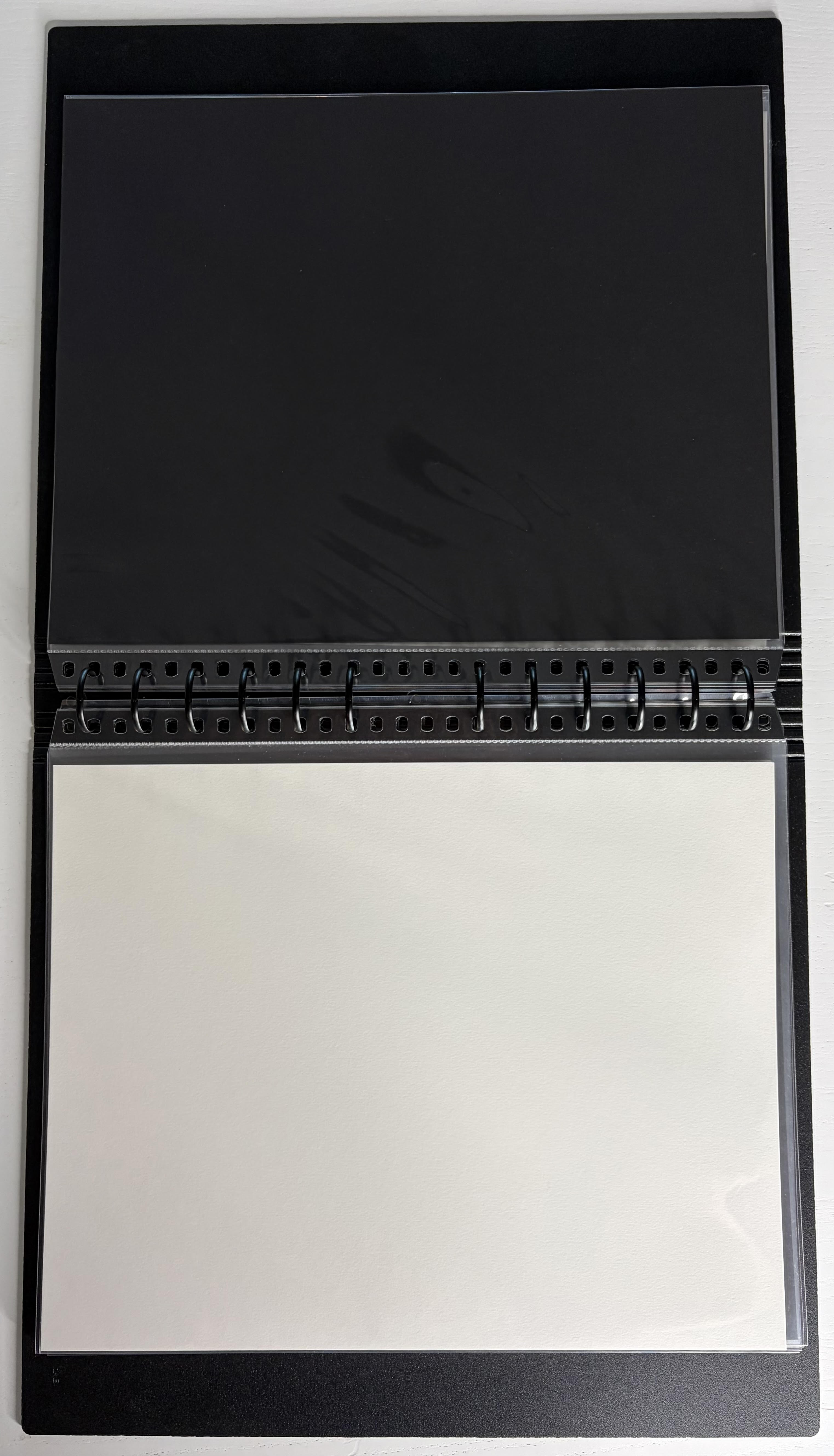 Itoya Upgrade Kit setup: preservation insert behind the polypropylene-sleeved cel inside an Itoya PolyGlass sleeve.